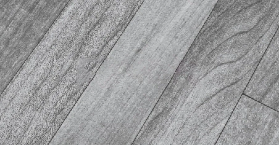 Close-up of flooring resembling gray wood